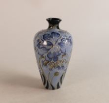 A Moorcroft blue geranium vase, height 15.5cm