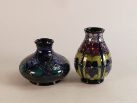 Two Moorcroft violets vases. Height of tallest 12.5cm(squat vase crazing) (2)