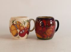 Two Moorcroft mugs to include Butterflies and Cockrell (2)