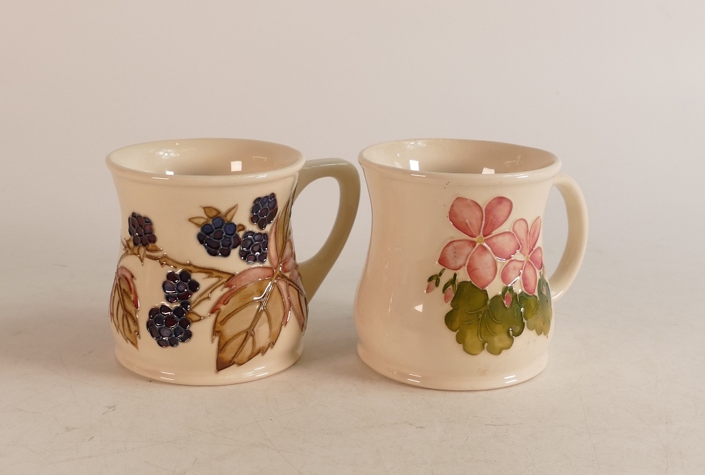 Two Moorcroft Mugs to include pink flowers on white ground and blackberry designed mug (2 )