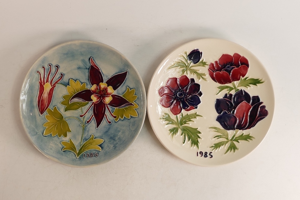 Moorcroft plates to include Anemone 1985 limited edition Cert) and 1984 limited edition. Boxed .