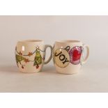 Two Moorcroft mugs to include Christmas Bulbuls and Dancing Christmas Trees (2)