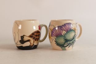 Two Moorcroft barrel mugs to include Tortoise & hare and thistle (2)