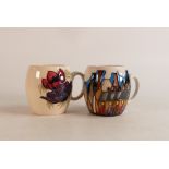 Two Moorcroft mugs to include Anemone and Burslem (2)