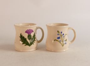 Two Moorcroft mugs to include bluebell and Scottish thistle (2)