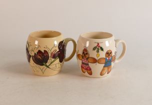 Two Moorcroft mugs to include Chocolate Cosmos and Run Run as Fast as You Can (2)