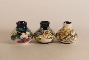 Three Moorcroft miniature squat vases to include Daisy May, Snowberry and limited edition 75/100