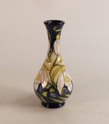 Moorcroft white floral bud vase on blue/ yellow ground, dated 2017, signed W. Sissons, height 17cm