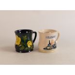 Two Moorcroft mugs to include Buttercup and Moorcroft Museum 1989