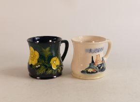 Two Moorcroft mugs to include Buttercup and Moorcroft Museum 1989