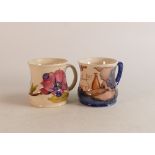 Two Moorcroft mugs to include Magnolia and M.C.C 1991 (2)