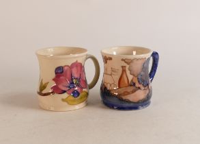 Two Moorcroft mugs to include Magnolia and M.C.C 1991 (2)