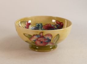 Moorcroft Orchid bowl on yellow / green faded ground. Diameter 16cm
