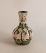 Moorcroft vase in the Lily Come Home pattern, designed by Emma Bossons, dated 2006, decorated with