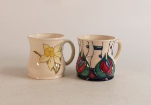 Two Moorcroft mugs to include Daffodil and Rennie Mackintosh Revisited (2)
