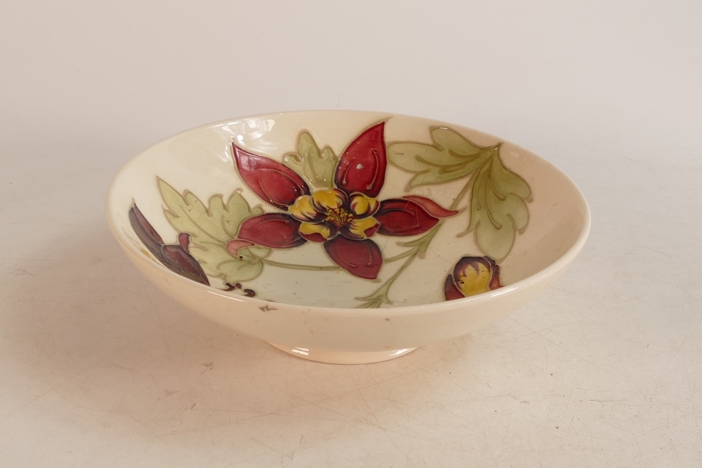 Moorcroft Columbine bowl on cream. Diameter 18.5cm