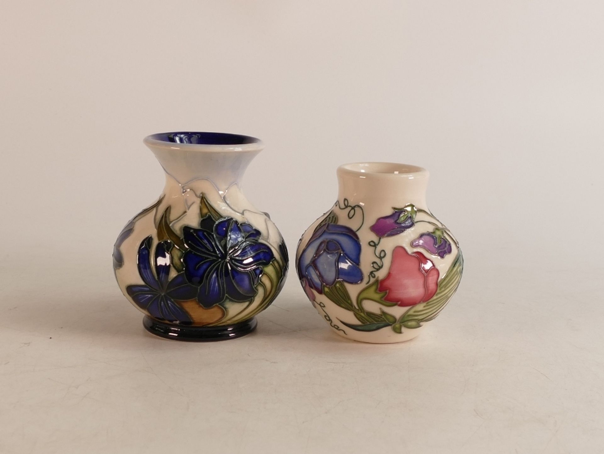 Moorcroft Chilean Crocus patterned vase together with Sweetness patterned vase, height of tallest