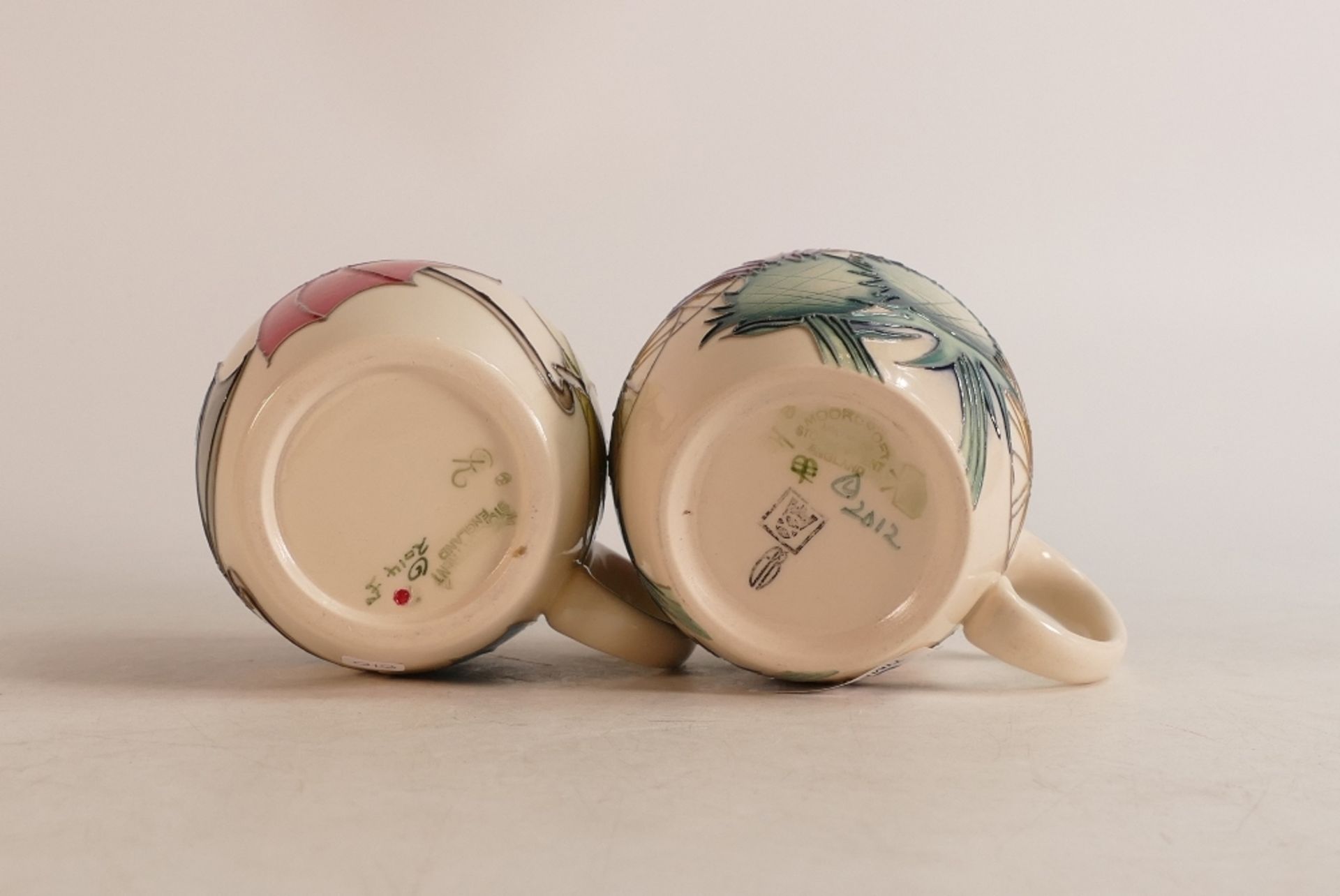 Two Moorcroft mugs to include Thistle and Umbrellas (2) - Image 2 of 2