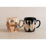 Two Moorcroft barrel mugs to include run run as fast as you can and Cats (2)