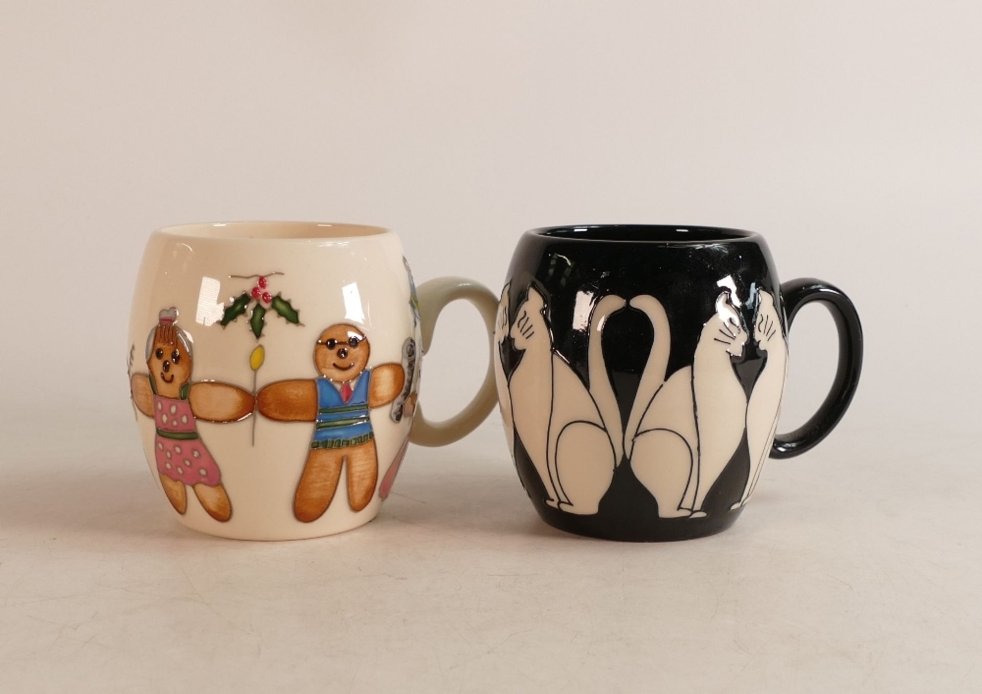Two Moorcroft barrel mugs to include run run as fast as you can and Cats (2)