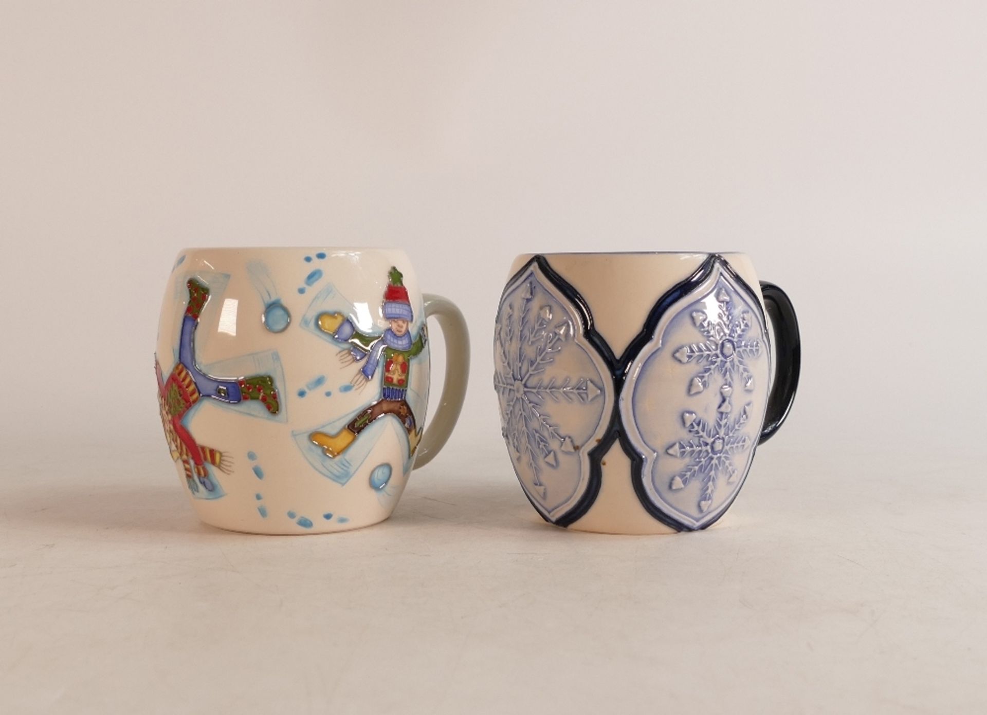 Two Moorcroft mugs to include Snow Angel and Snowflake (2)