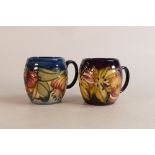 Two Moorcroft mugs to include Endangered Species and Tiger Lilly (2)