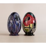 Two Moorcroft eggs blue on blue bluebell pattern and Macintosh Rose egg, height 10cm