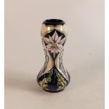 Moorcroft vase in the Meadow Star design, dated 2001, limited edition 79/300, slight crazing, h.15.
