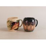 Two Moorcroft mugs to include Vegatable patch and Cluny(2)