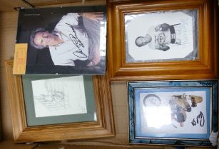 A collection of framed Signed items including Clint Eastwood, Henry Cooper, Winnie The Pooh , Orange