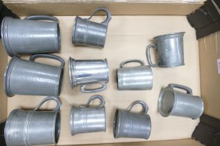 A collection of pewter and metalware to include Cornish, tankards, measuring jug, etc (1 tray)