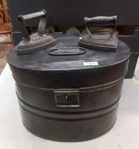 Painted metal storage box together with 2 x cast iron irons (3).