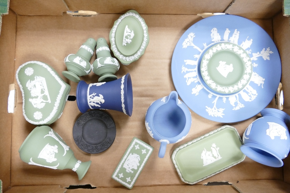 A collection of Wedgwood Jasperware to include salt and pepper pots, pin dishes, vases, milk jug,