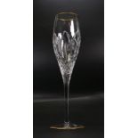 Four Large Quality Atlantis Cut Glass Crystal Champagne Flutes with gold rims, height 26cm