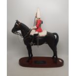 Beswick Connoisseur Lifeguard on horse 2562 on wooden plinth.