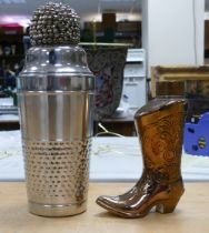 A large metal cocktail shaker together with empty Faberge west cowboy boot decanter (2)