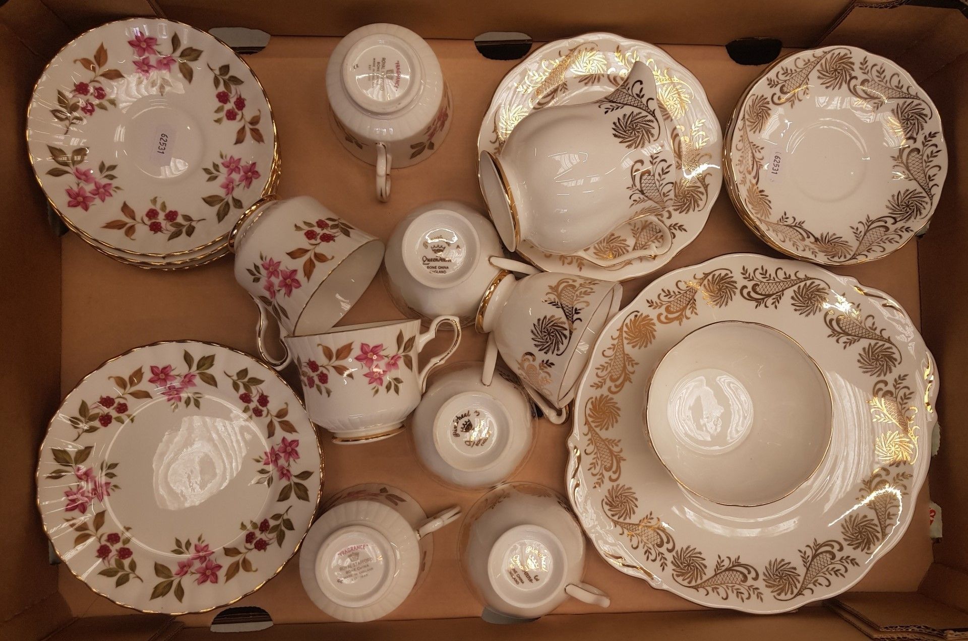 Queen Anne 15-piece tea set together with Royal Stafford Fragrance pattern trio's x 4 (1 tray).