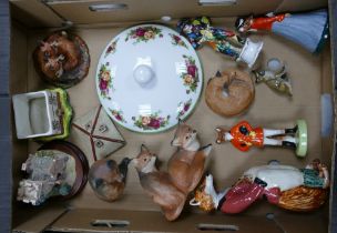 A mixed collection of items to include Anysley foxes, ceramic huntsman fox, Lilliput Lane lodge, etc