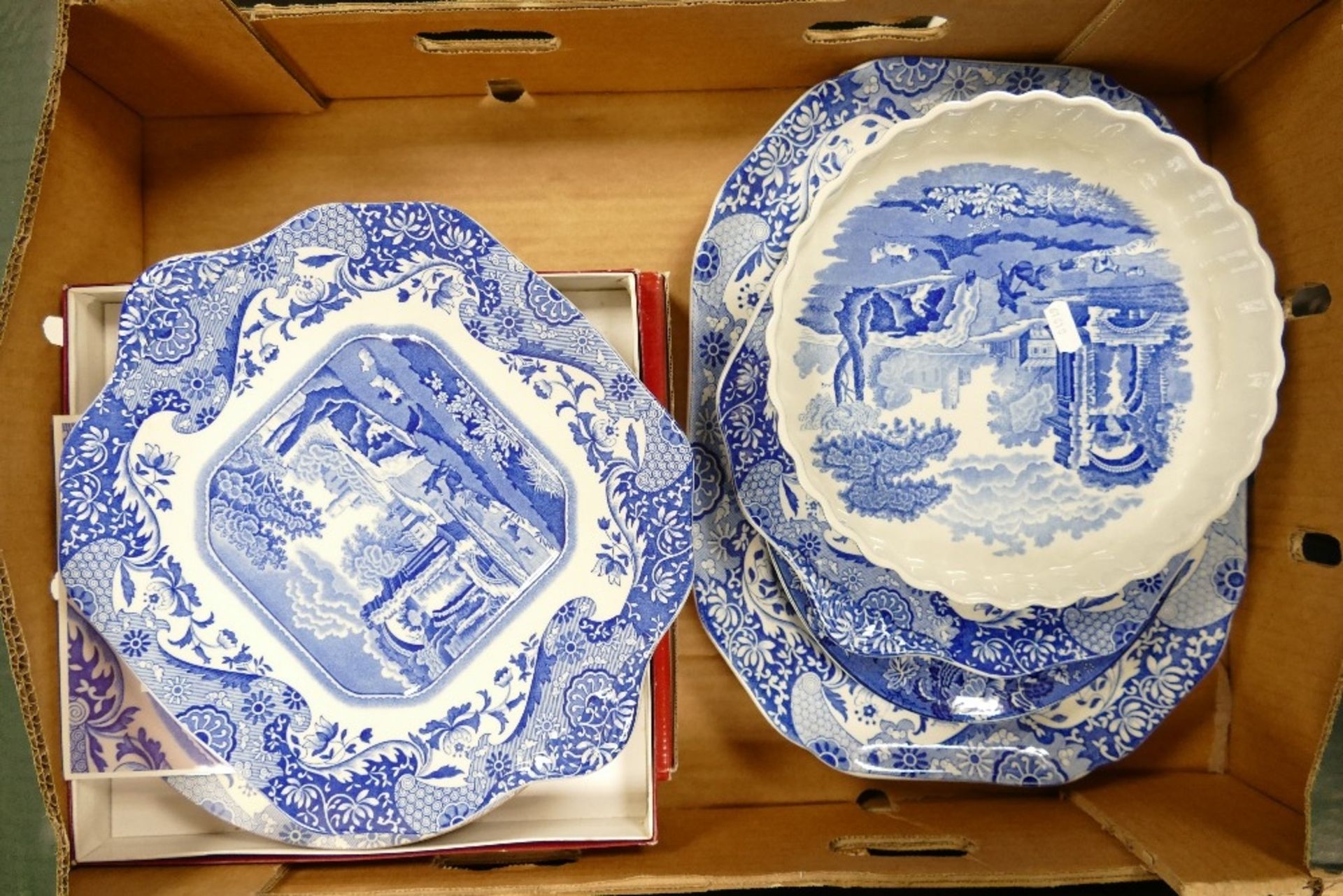 A collection of Spode Blue Italian items to include cake plate, flan dish, placemats, serving