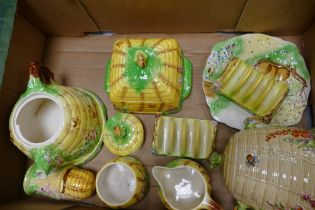 Royal Winton Beehive tea and dinnerware items to include biscuit barrel, milk jug, sugar dish,