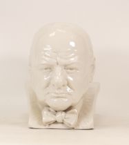 A Ceramic Bust of Winston Churchill. Some chips and cracks. Height: 23cm