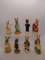 A collection of 8 Royal Doulton Bunnykins figures to include Santa DB17, Policeman DB64, Shopper
