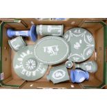 A collection of Wedgwood Jasperware to include tea caddy, vases, candlestick, dressing table tray,