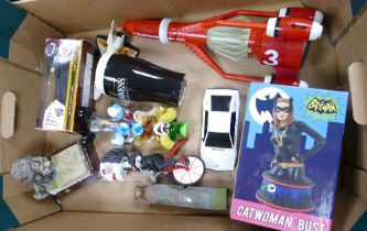 A mixed collection of items to include boxed Catwoman Bust, Thurderbird 3 figure, James Bond 007
