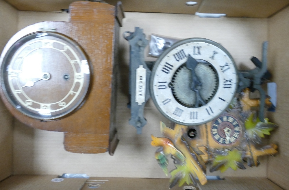A Collection of Three Clocks to include one cuckoo clock and one art deco mantle clock with bakelite