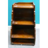 A Late 19th / Early 20th Century Small Tapering Four-Tier Bookcase. Sides have Screwed on Banding