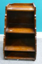 A Late 19th / Early 20th Century Small Tapering Four-Tier Bookcase. Sides have Screwed on Banding