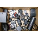 A collection of cameras and lenes to include Miranda EE , Miranda sensomat , Tamron SP lens ,