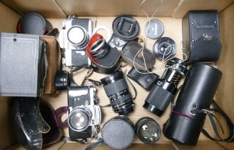 A collection of cameras and lenes to include Miranda EE , Miranda sensomat , Tamron SP lens ,