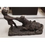 Heredities bronzed resin figure depicting a boy and pony, length 33cm.